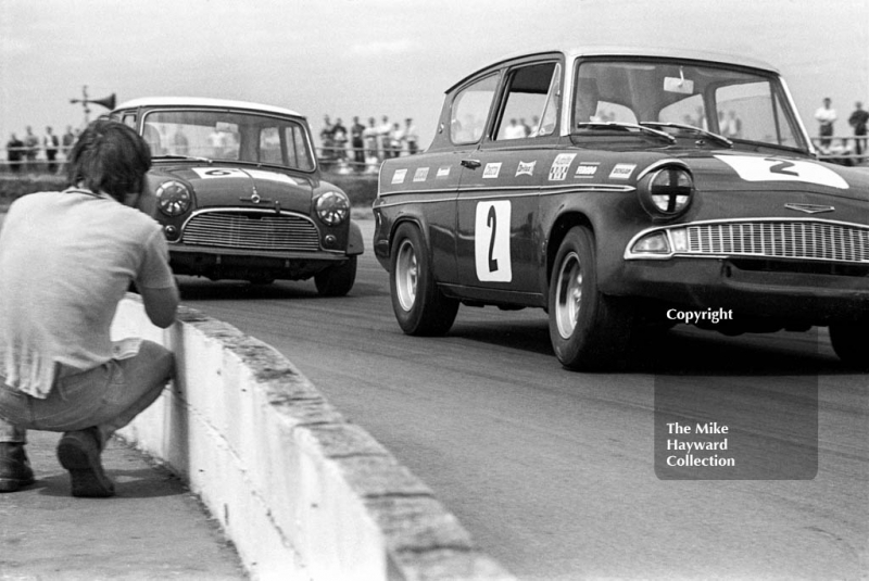 Les Nash, Ford Anglia, and Rob Mason, Don Moore Mini Cooper, Silverstone, British Grand Prix meeting 1969.
