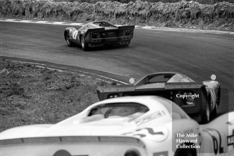 Paul Hawkins/Jonathan Williams, Lola T70, followed by Jo Bonnier/Herbert Muller, Lola T70, and Gerhard Koch/Hans-Dieter Dechent, Porsche 907, Brands Hatch, 1969 BOAC 500.
