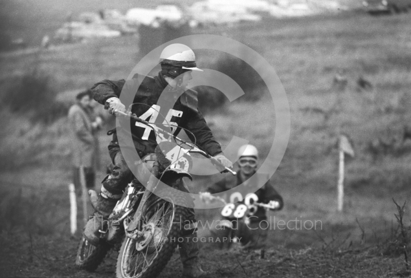 Rider looks behind, motorcycle scramble at Spout Farm, Malinslee, Telford, Shropshire between 1962-1965