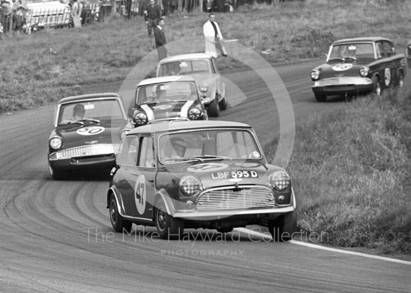 Steve Neal, Equipe Arden Mini Cooper S, LBF 595D, followd by Chris Craft, Ford Anglia, and John Rhodes, Mini, Oulton Park Gold Cup meeting, 1967.

