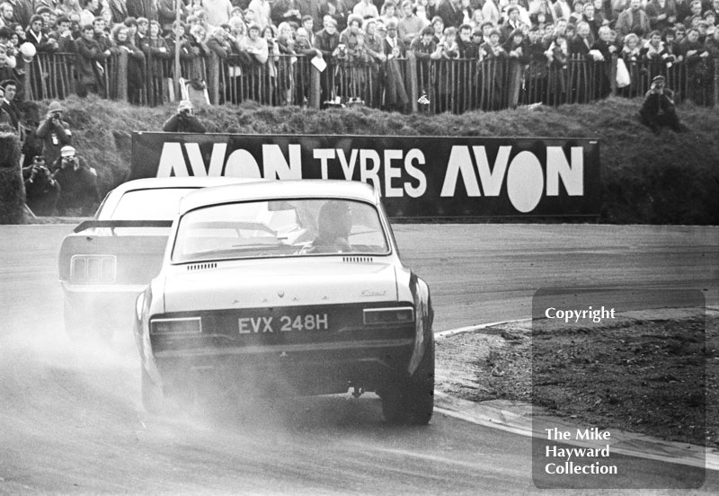 Chris Craft, Broadspeed Ford Escort (EVX 248H), chases Frank Gardner's Motor Racing Research Ford Mustang at Druids Hairpin, Guards Trophy Touring Car Race, Race of Champions, 1970
