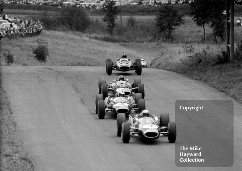 Jack Brabham, Repco Brabham BT19, Denny Hulme, BT20, Jackie Stewart, BRM P83 H16, Graham Hill, P83 H16 and Jim Clark, Lotus Climax 33, 1966 Gold Cup, Oulton Park.
