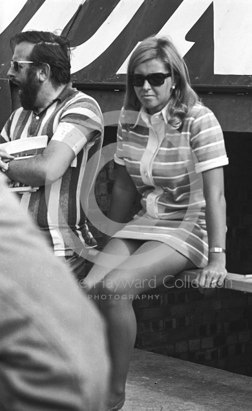 Fashion in the pits, Silverstone, 1969 British Grand Prix.
