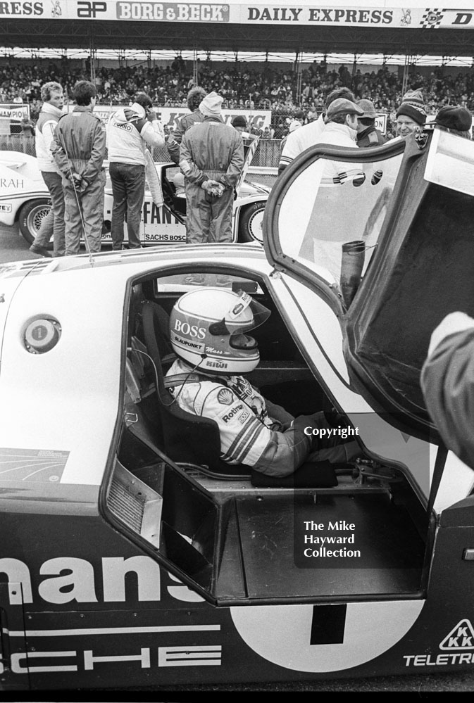Jochen Mass waits on the grid in the winning Rothmans Porsche 956 he shared with Jacky Ickx, 1985&nbsp;World Sports Car Championship, Silverstone
