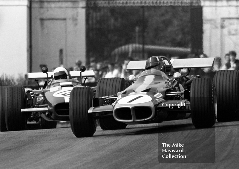 Graham Hill, Roy Winkelmann Lotus 59B, and Keith Holland F5000 Lola T142, Oulton Park Gold Cup meeting, 1969.