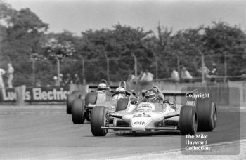 Jacky Ickx, Ligier JS11, leads Jochen Mass, Arrows A2, 1979 British Grand Prix, Silverstone.
