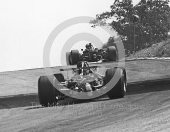 Piers Courage, BRM P126 V12, exits South Bank Bend ahead of Jochen Rindt, Brabham BT26, British Grand Prix, Brands Hatch, 1968.