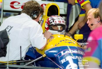 Nigel Mansell, Williams FW14, in the pits during the 1992 British Grand Prix, Silverstone.
