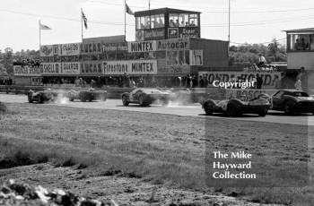 The start of the Grovewood Trophy, Sunday May 29th 1966, Mallory Park. Leaving the grid are Peter Sutcliffe, Ford GT40, Brian Muir, Lotus 30 Ford, Frank Gardner, McLaren Elva Ford, David Hobbs, Lola T70 Chevrolet and David Piper, Ferrari 250LM.
