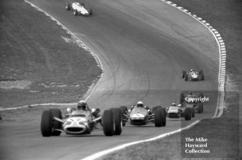 Jack Brabham, Brabham BT23-2, following Jackie Stewart, Matra MS7-02, followed by Piers Courage, McLaren M4A-2, Guards European F2 Championship, Brands Hatch, 1967.
