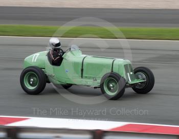1934 ERA R3A of Mark Gillies at Woodcote during the HGPCA event for front engine GP cars at 2010 Silverstone Classic
