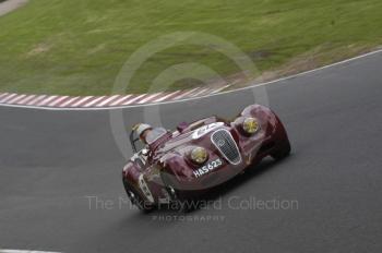 John Chisholm, 1950 Jaguar XK120, reg no HAS 623, BRDC Historic Sports Car Championship Race, Oulton Park Gold Cup meeting 2004.