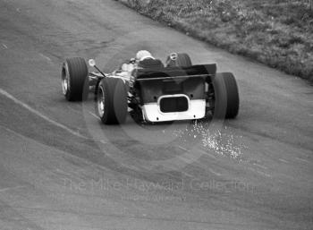 Sparks fly from beneath the Gold Leaf Team Lotus 56B turbine of Reine Wisell at Deer Leap, Oulton Park Rothmans International Trophy, 1971
