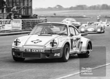 Mike Franey, Porsche Carrera, followed by Louis Lorenzini, Ferrari 312P, Philips Car Radio Ferrari/Porsche race, F2 International meeting, Thruxton, 1977.
