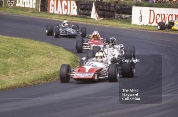 Roger Williamson, March 713M; James Hunt, March 713M; Dave Walker, Gold Leaf Team Lotus Novamotor; and Brendan McInerney, March 713M; Oulton Park, Gold Cup meeting 1971. The Martini MW7 of Jacques Dolhem can be seen in the background.
