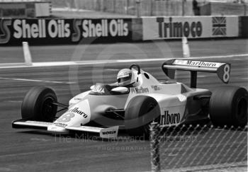 Niki Lauda, Marlboro McLaren MP4 at Woodcote Corner on the way to 6th place, British Grand Prix, Silverstone, 1983
