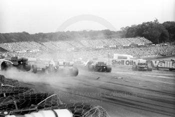 Allen Berg, Osella FA1H, airborne on the left, with Huub Rothengatter, Zakspeed 861, centre, Alessandro Nannini, Minardi M185B, and Jacques Laffite, Ligier JS27, right, Brands Hatch, British Grand Prix 1986.
