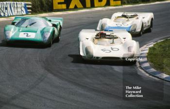 Hans Hermann/Rolf Stommelen, Porsche 908, David Piper/Pedro Rodriguez, Lola T70 Mk 3, and Vic Elford/Richard Attwood, Porsche 908, Brands Hatch, BOAC 500, 1969.
