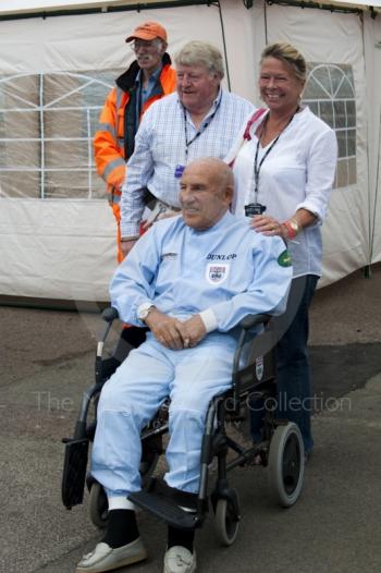 Sir Stirling Moss and wife Susie in the paddock, Silverstone Classic 2010