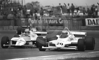Keke Rosberg, Fittipaldi F8C, and John Watson, McLaren MP4, Silverstone, British Grand Prix 1981.
