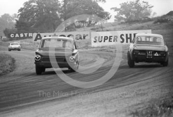 Geoff Breakell, Alfa Romeo GTA, LWY 39D, heading for 5th place in Class A, leads a Lotus Cortina out of Cascades, Oulton Park Gold Cup meeting, 1967.
