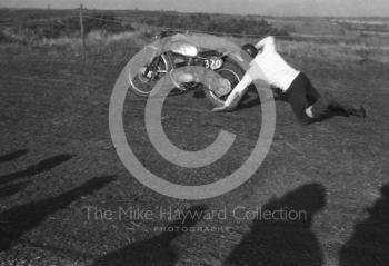 Rider loses his bike, motorcycle scramble at Spout Farm, Malinslee, Telford, Shropshire between 1962-1965