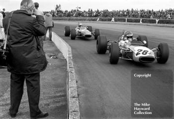 Ronnie Peterson, Tecno 69, followed by Reine Wisell, Chevron B15, 1969 British Grand Prix meeting.
