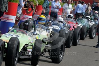 Rudolf Ernst, 1960 Lotus 18, heads the queue in the paddock prior to the HGPCA pre-1966 Grand Prix Cars Race, Silverstone Classic 2009.
