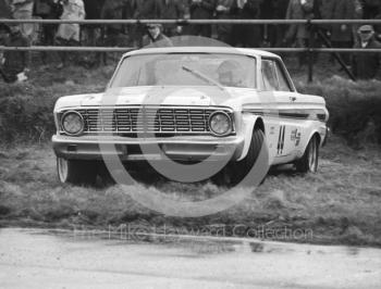 Terry Sanger investigates the wet grass in his Ford Falcon, Silverstone International Trophy meeting 1969.
