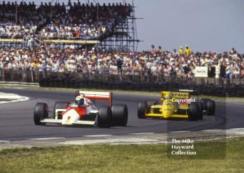 Alain Prost, Marlboro McLaren MP4-3 and Ayrton Senna, Camel Lotus 99T. Copse Corner, British Grand Prix, Silverstone, 1987
