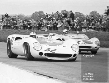 Denny Hulme, Sid Taylor Lola T70, and John Scott-Davies, Aintree Circuit Racing Team Lotus 19, Silverstone International Trophy meeting 1966.
