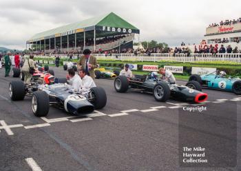 Front row for the Glover Trophy: Geoff Farmer, Rob Walker Lotus 49B; Paul Ingram, BRM P126; and John Beasley, Brabham BT11 Climax; Goodwood Revival, 1999
