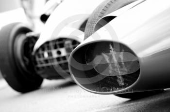 Black and white study of Maserati 250F and Connaught  noses in the paddock, HGPCA Front Engine Grand Prix Cars, Silverstone Classic 2010