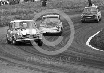 Chris Montague, Alexander Engineering Mini Cooper S, heading for 4th place in class, and timed at 110.97mph on Knickerbrook Straight, Oulton Park Gold Cup meeting, 1967. Following in his wake are Bernard Unett, Hillman Imp, and Tony Lanfranchi, also in a Hillman Imp.
