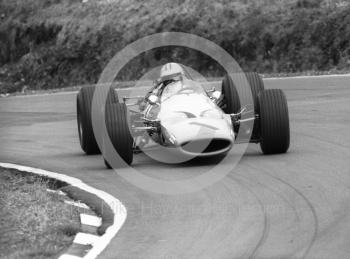 Denny Hulme, McLaren M7A/2, at Druids Hairpin, British Grand Prix, Brands Hatch, 1968.
