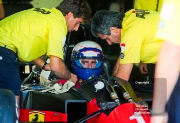 Alain Prost, Ferrari 641, in the pit garage at Silverstone, British Grand Prix 1990.
