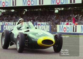 Stirling Moss, 1957 Vanwall, at Woodcote, Coys International Historic Festival, July 1993, Silverstone.
