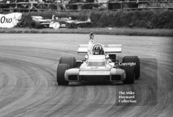 A winning salute from Graham Hill, Brabham BT34, at the Silverstone International Trophy 1971.
