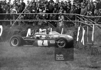 Paul Purseglove inspects the bank at Copse Corner, Brabham BT28, Silverstone, International Trophy meeting 1970.
