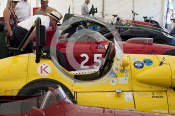 A spectator gets a close look at Tony Smith's Ferrari Dino 246, parked next to David Wenman's Connaught A4, Silverstone Classic 2010