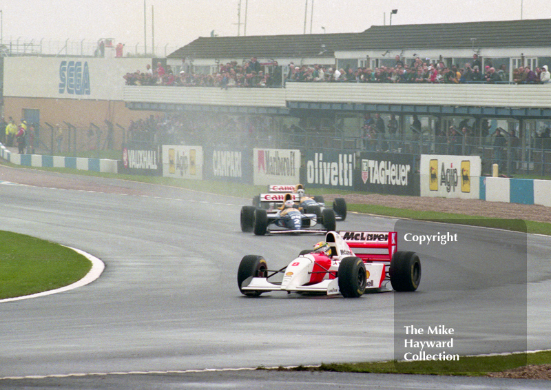 After a spectacular lap, Ayrton Senna, McLaren MP4/8 leads the Williams of Alain Prost and Damon Hill at Redgate, Donington Park, European Grand Prix 1993.