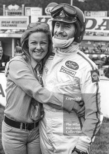 Graham Hill meets a fan on the grid at Brands Hatch, 1968 British Grand Prix.
