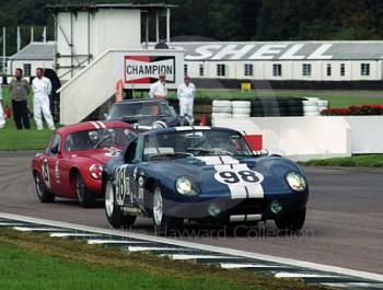 A Shelby Cobra leads Robin Longdon's Lotus Elite out of the chicane, Goodwood Revival, 1999