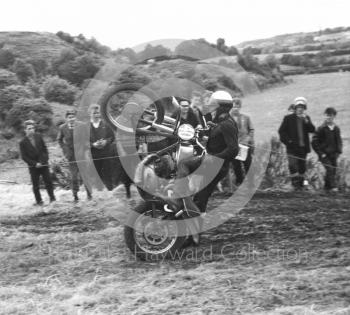 One wheel landing, motorcycle scramble at Spout Farm, Malinslee, Telford, Shropshire between 1962-1965