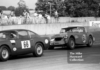 Denis Welch, Austin Healey 100/6, chases John Goate, Aston Martin DB4, Historic Championships Meeting, Donington Park, 1983.
