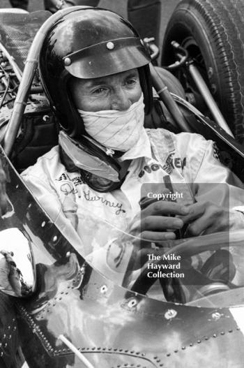 Dan Gurney in his Eagle Weslake V12 104 on the grid at Silverstone before the start of the 1967 British Grand Prix.
