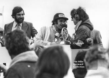 Brian Henton, Boxer PR2 Hart, receives the Jochen Rindt Memorial Trophy at the F2 International meeting, Thruxton, 1977.
