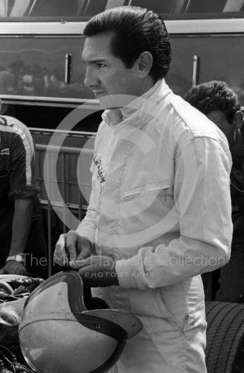 Pedro Rodriguez, Cooper Maserati V12 T81, prepares for the start of the 1967 British Grand Prix at Silverstone.
