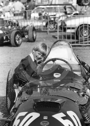 A young spectator admires David Grant's Elva BMC Formula Junior, Historic Championships Meeting, Donington Park, 1983.
