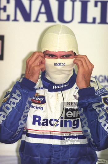 Damon Hill in the pit garage during practice, Silverstone, British Grand Prix 1996.
